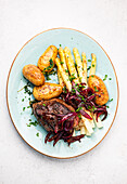 Steak with white asparagus and potatoes