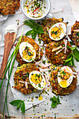 Zucchini fritters with boiled egg and yogurt dip