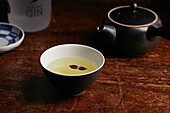 Jasmine tea in tea bowl and teapot