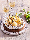 Chocolate pear cake with whipped cream