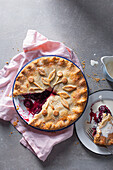 Cherry pie with a slice cut out