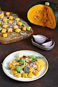 Pumpkin gnocchi with cauliflower and hazelnuts