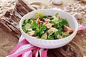 Summer salad with salmon, capers, lamb s lettuce and Parmesan cheese