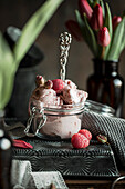 Raspberry-strawberry ice-cream served in a bow glass