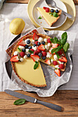 Amalfi lemon tart with berries and cream dots