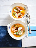 Fish soup with pike dumplings, dill and yellow beetroot