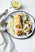 Filled omelette vegetable rolls with wasabi mayo and udon noodle salad