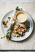 Goat's cheese-and-fig rolls with a lemon dip and a spicy bulgur salad