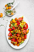 Mixed tomato salad with chanterelles