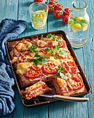 Baked cheese, ham and tomato sandwiches