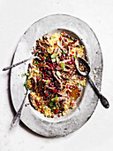 Slow-cooked lamb with couscous and pomegranate