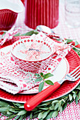 Red and white Christmas place setting