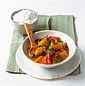 Vegan tomato and pumpkin curry with spinach