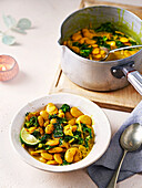 Healthy turmeric-and-ginger butter beans with kale