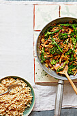 Stir-fried turkey with sauerkraut, broccolini and mushrooms