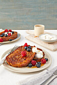 French toast with maple syrup, berries and cinnamon