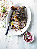 Barbecued spiced lamb shoulder with beetroot raita