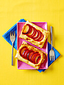 Puff pastry with red plums