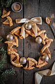 Cinnamon-sugar witch hats arranged in a wreath shape