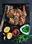 Grilled chicken with herbs, lemon and garlic