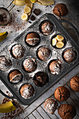 Chocolate banana muffins in a muffin tin
