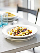 Pasta with caramelised red onions and blue cheese