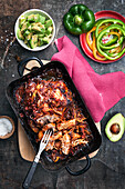 Pulled pork with green peppers and avocado salad