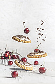 Cherry tartlets with yogurt and chocolate shavings