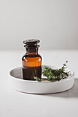 Apothecary bottle and herbs