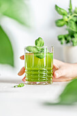 Apple juice with mint and basil