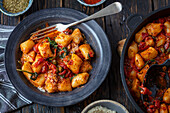 Gnocchi with tomato sauce and spinach