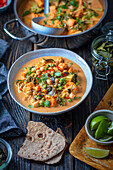 Red curry with cauliflower, broccoli and chickpeas
