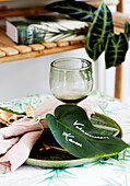 Place setting with leaf used as place card