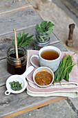 Sage plantain tea and horseradish honey