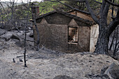 House burnt by wildfires in Spain