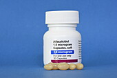 Bottle of Alfacalcidol and capsules