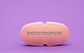 Benztropine pill, conceptual image