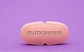 Fluticasone pill, conceptual image