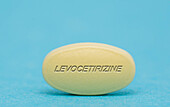 Levocetirizine pill, conceptual image