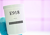 Container of the food additive E918