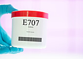 Container of the food additive E707