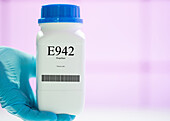 Container of the food additive E942