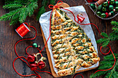 Puff pastry pull apart bread in the shape of a fir tree