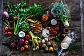Fruit, vegetables and various foodstuffs on a rustic wooden table