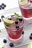 Gin mojitos with blueberries