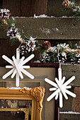 Christmas DIY snowflake decoration made from wooden popsicle sticks