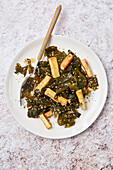 Japanese wakame seaweed salad with tofu and sesame seeds