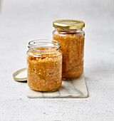Homemade vegetable stock paste in screw top jars