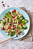 Penne broccoli salad with chickpeas, tomatoes and spinach