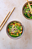 Green soba noodle soup with chicken